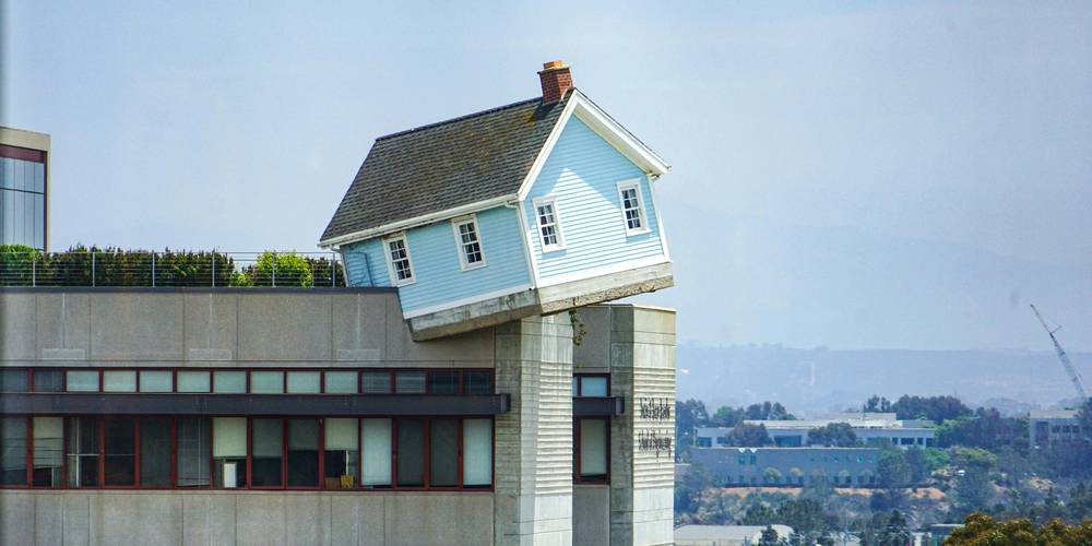California tenants reviewing rent cap rules during a lease meeting