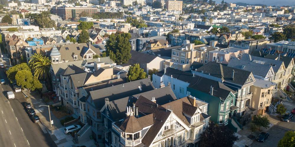 Renters reviewing a California lease and discussing rent control regulations