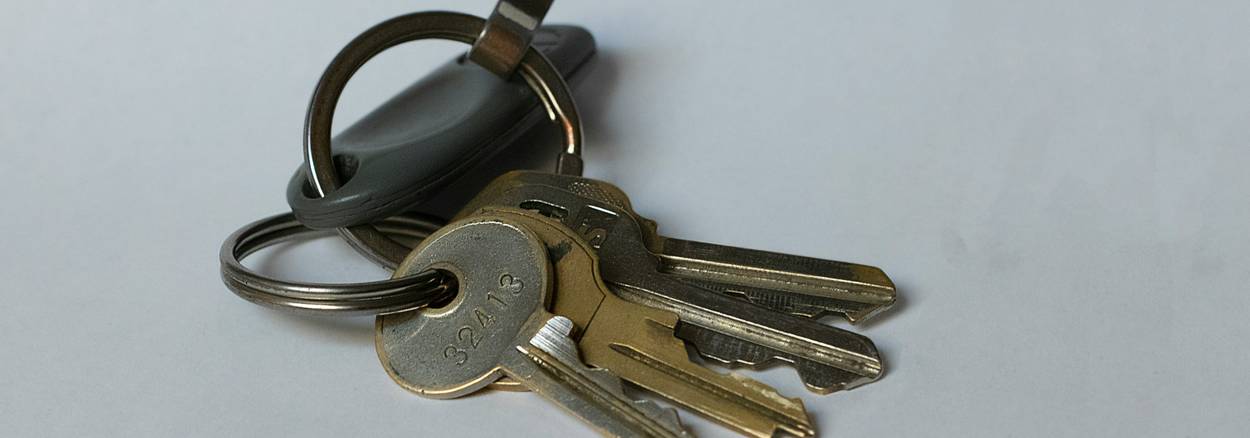 Tenant holding keys while reviewing checklist